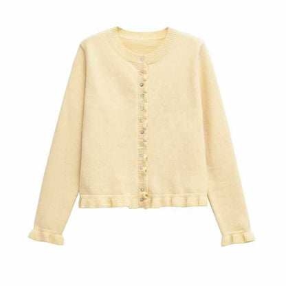 Dames cardigan en tricot confortable avec des boutons décoratifs et un design à volants tendance Chic und Stil