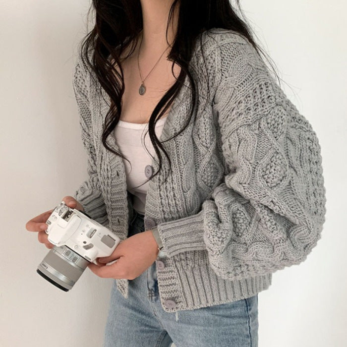 Cardigan femme en grosse maille avec motif en relief et détails de boutons Chic und Stil