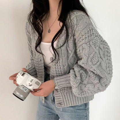 Cardigan femme en grosse maille avec motif en relief et détails de boutons Chic und Stil