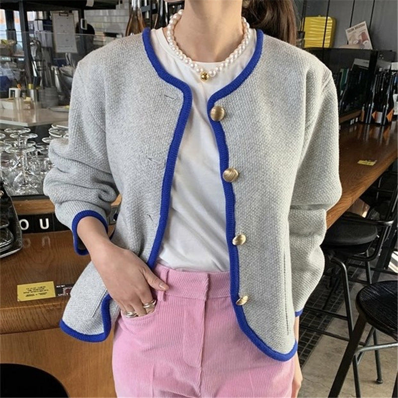 Cardigan pour femmes avec des boutons décoratifs et un col contrasté Chic und Stil