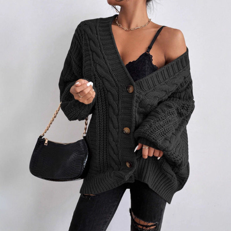 Dames grosse tricot cardigan avec des manches larges et des détails de boutons Chic und Stil