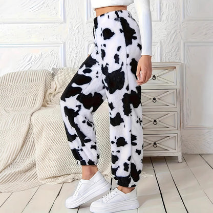 Women's plush pants with a trendy cow spot pattern and an elastic waist Chic and Style