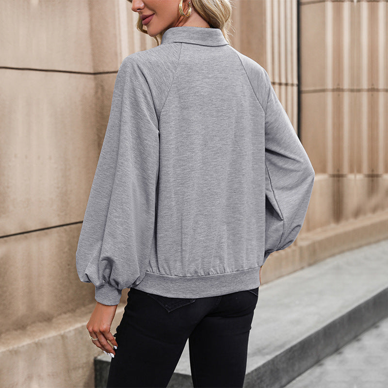 Pull en molleton à manches longues pour femmes avec patte de boutonnage et manches ballon Chic und Stil