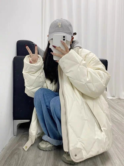 Functional quilted jacket for women with high collar and practical pockets Chic and Style