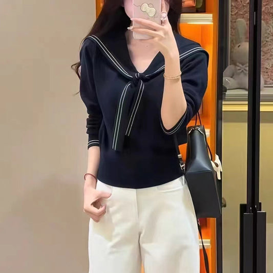 Pull femme élégant avec col à nœud et fine structure en tricot Chic und Stil