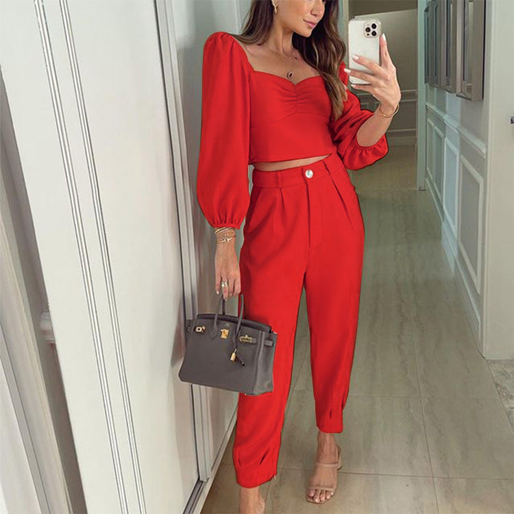 Two-piece outfit for women with puff sleeves and elegant high-waisted pants Chic und Stil