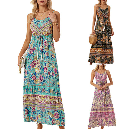 Robe maxi aérienne pour femmes avec un design floral ludique et un tirage à la taille Chic und Stil