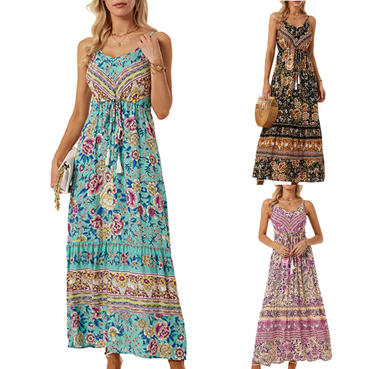 Robe maxi aérienne pour femmes avec un design floral ludique et un tirage à la taille Chic und Stil