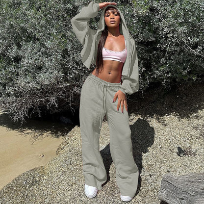 Dames Combinaison de sport à capuche avec haut court et pantalons amples Chic und Stil