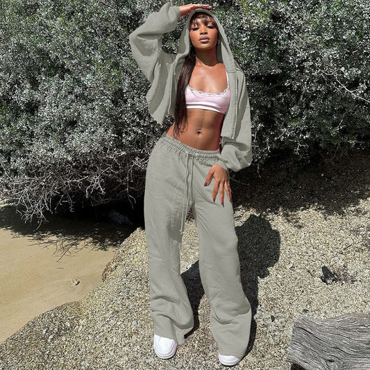 Dames Combinaison de sport à capuche avec haut court et pantalons amples Chic und Stil