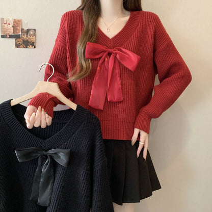 Pull en tricot pour femme avec décolleté en V et accent de nœud décoratif Chic und Stil