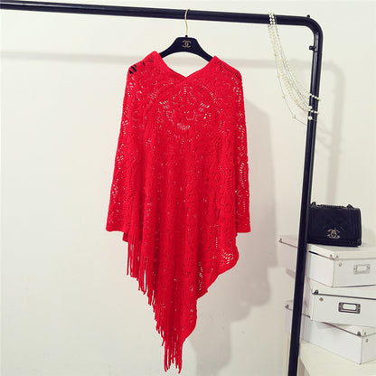 Poncho en tricot pour dames avec des motifs en crochet artistiques et des franges Chic und Stil