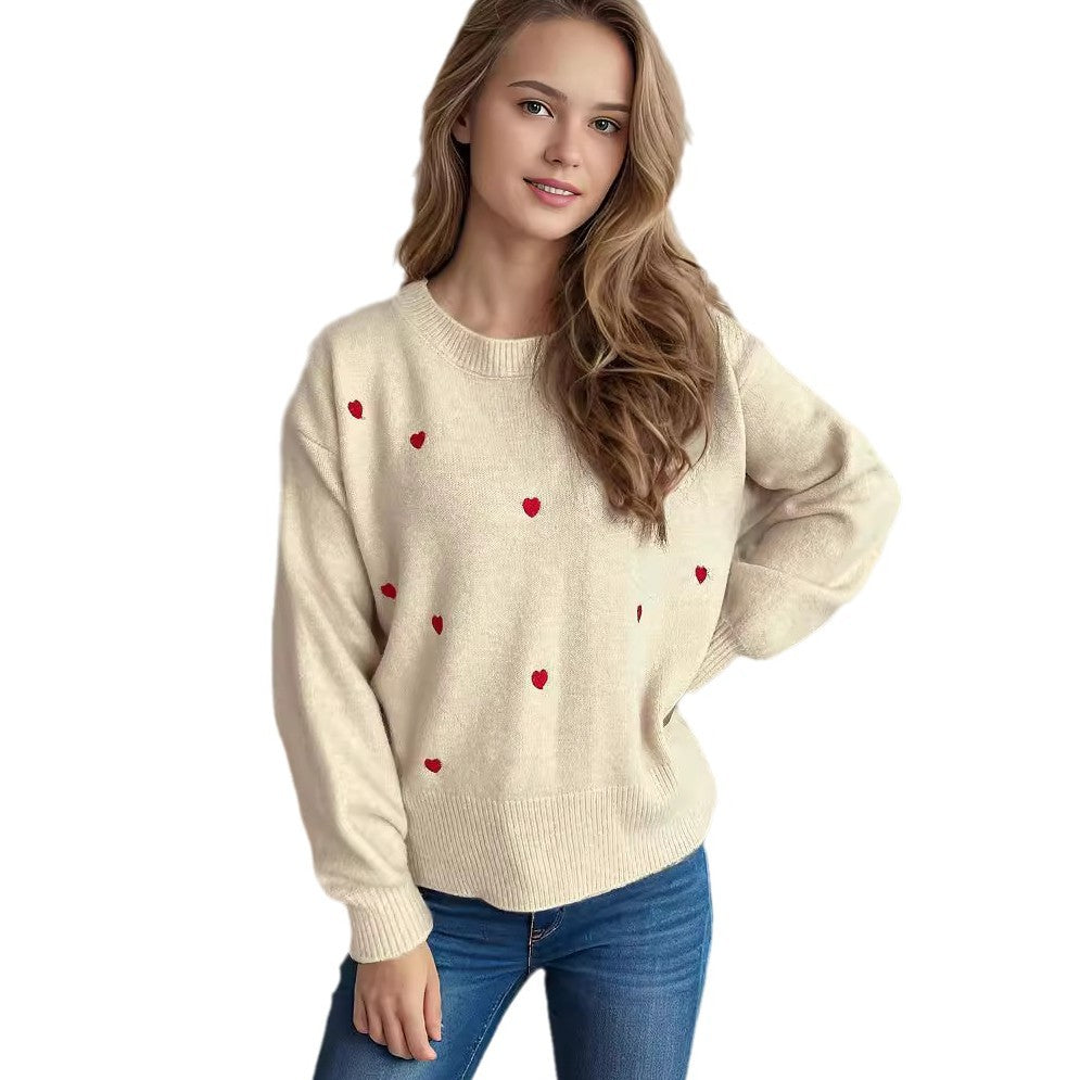 Pull femme avec un design de cœur ludique Chic und Stil