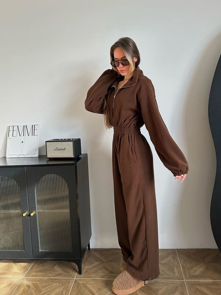 Women's fleece jumpsuit with large puff sleeves and a high neck. Chic and stylish.