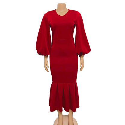 Robe ajustée pour femmes avec des manches volumineuses et un ourlet flottant Chic und Stil