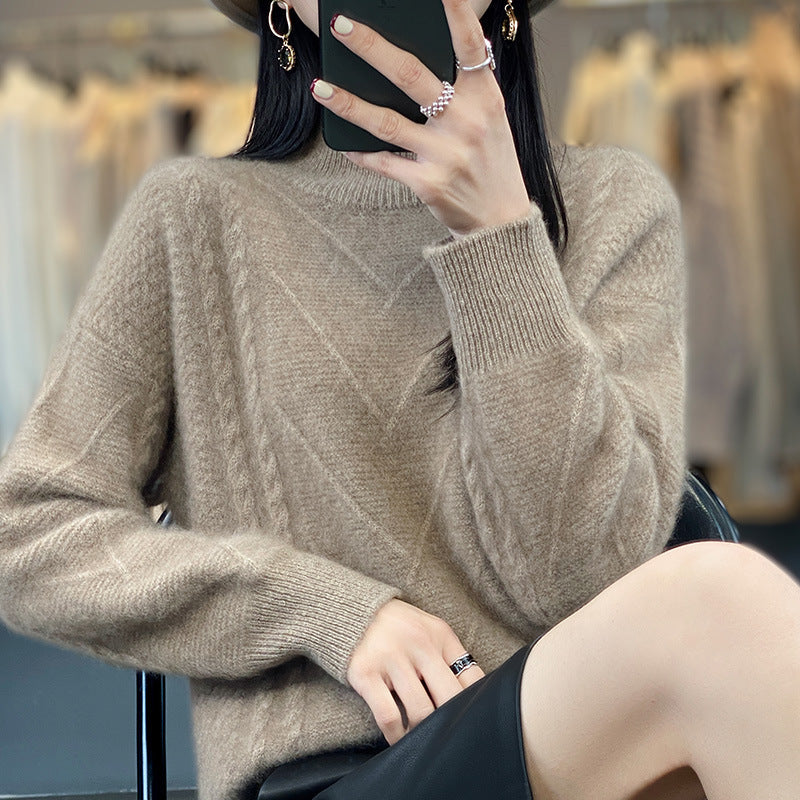 Pull femme en maille épaisse avec un motif en torsades innovant et un col montant haut Chic und Stil