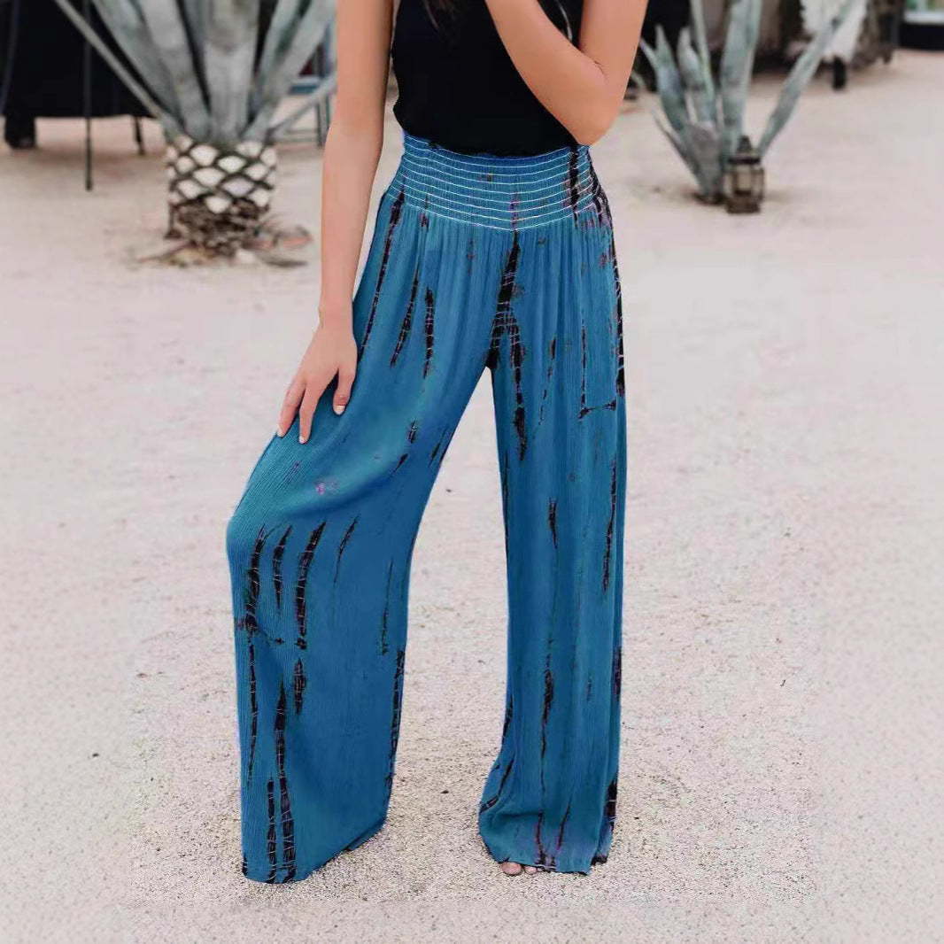 Wide pleated pants for ladies with elastic waistband and trendy pattern Chic und Stil