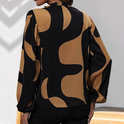 Blouse féminine tendance avec imprimé géométrique et manches volumineuses Chic und Stil