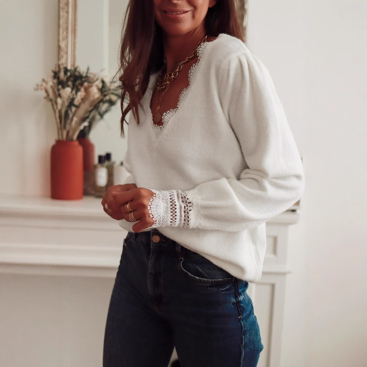 Pull en tricot pour femmes avec col en dentelle et manches bouffantes Chic und Stil