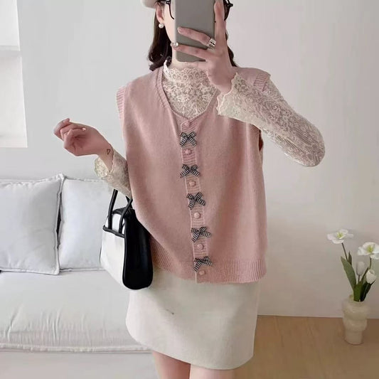 Pull en tricot tendance pour femmes avec grand col et nœuds décoratifs Chic und Stil