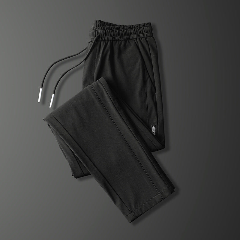 Men's sports pants with adjustable drawstring and zippered pockets on the sides Chic and Style