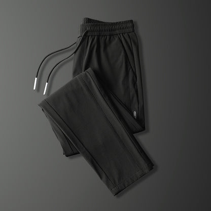 Men's sports pants with adjustable drawstring and zippered pockets on the sides Chic and Style