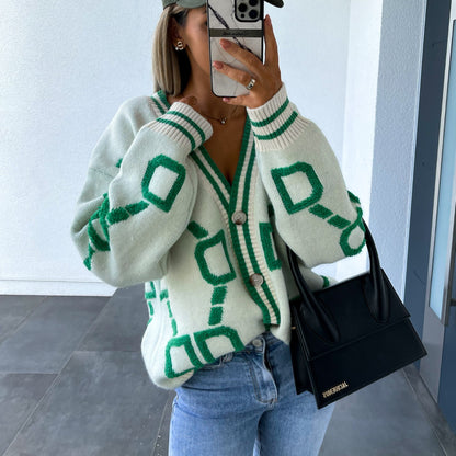 Cardigan féminin tricoté avec motif texturé et détails de boutons Chic und Stil