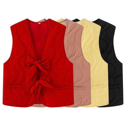 Dames gilet matelassé avec ceinture nouée double et poches latérales pratiques Chic und Stil