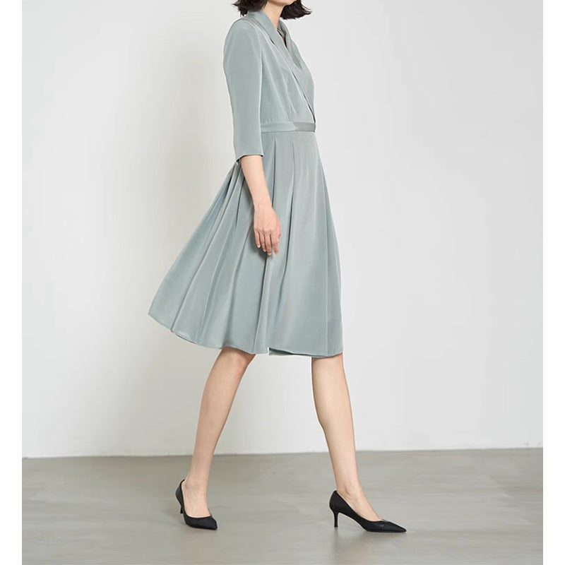 Robe midi A-Line fluide pour femme avec un élégant détail de bouton Chic und Stil