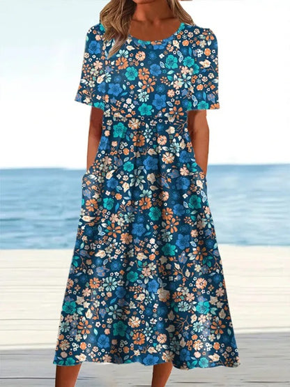 Robe maxi femme avec imprimé floral et poches latérales pratiques Chic und Stil