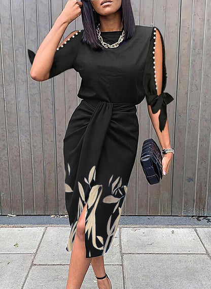 Robe portefeuille pour dames avec des manches décoratives et un ourlet floral Chic und Stil
