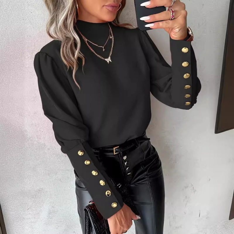 Blouse élégante pour femmes avec des manches bouffantes et des détails de boutons dorés Chic und Stil