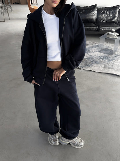 Dames Ensemble de détente sportif avec veste à capuche confortable et pantalons larges Chic und Stil