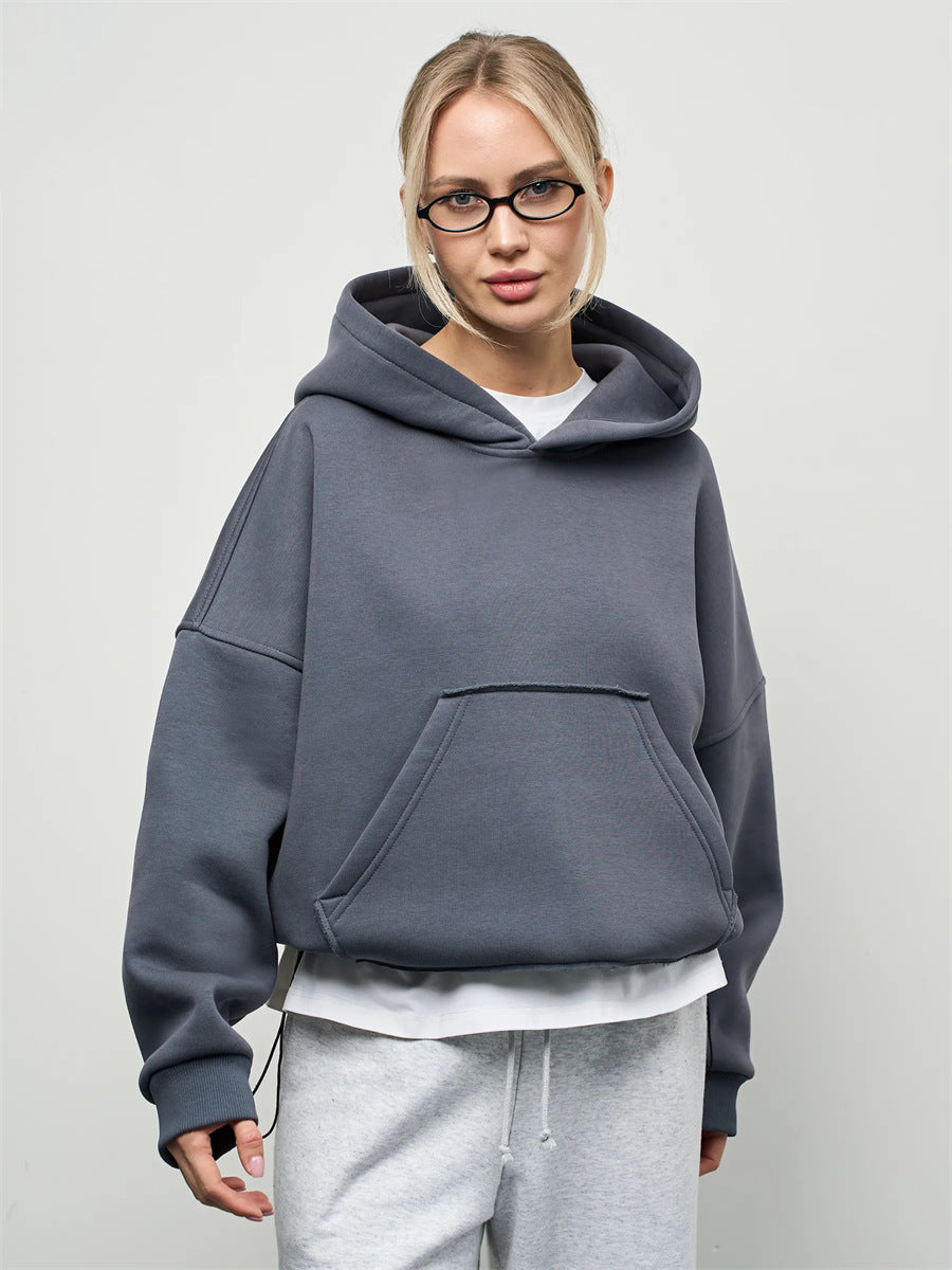 Pull à capuche oversized pour femmes avec une coupe décontractée et une poche kangourou pratique Chic und Stil