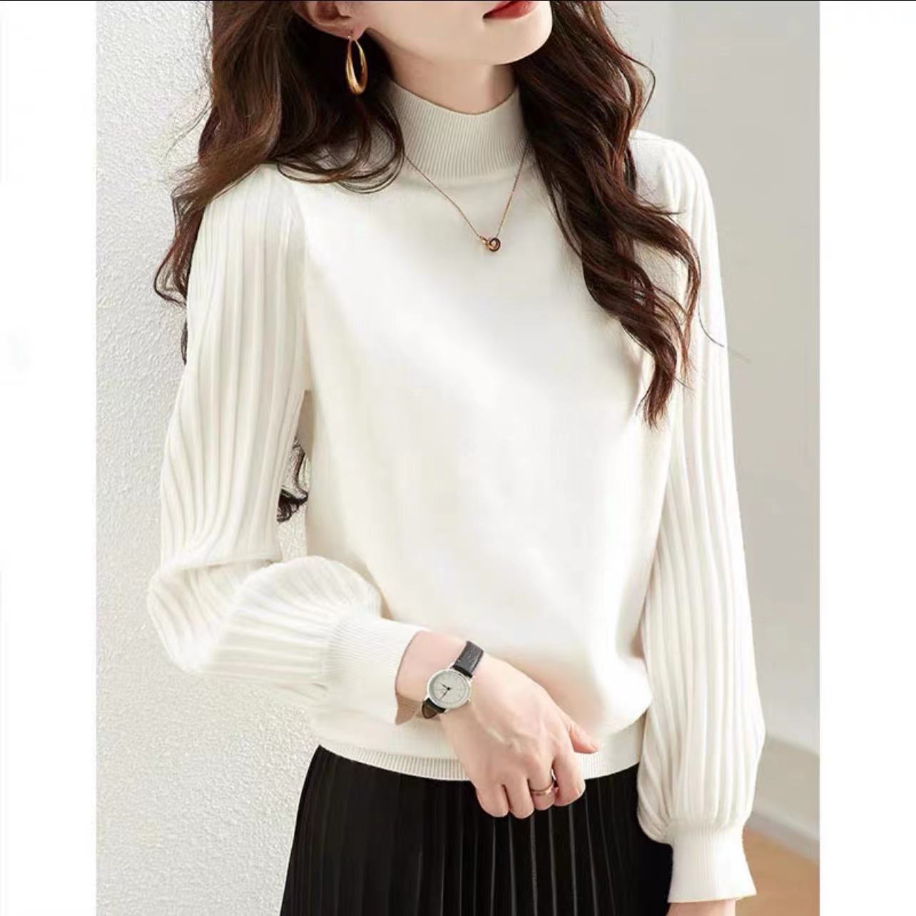 Pull élégant pour femmes avec des manches tricotées hautes Chic und Stil