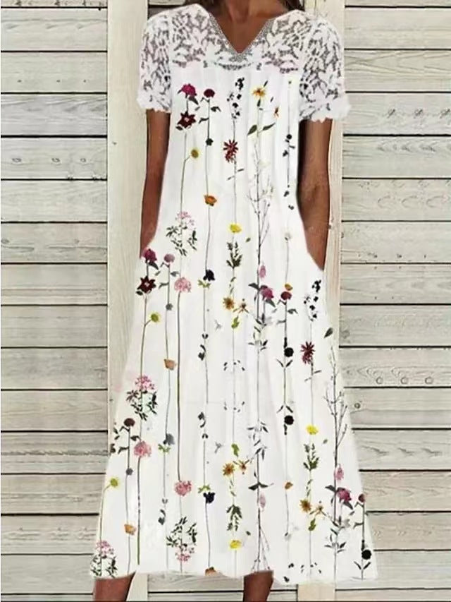 Robe maxi dames avec décolleté haut en dentelle et design floral orné de poches Chic und Stil
