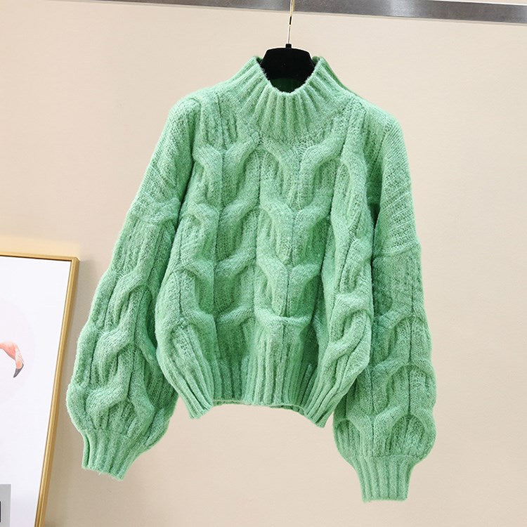 Pull en tricot confortable pour femmes avec des manches volumineuses et un motif torsadé Chic und Stil