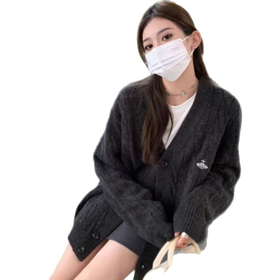 Cardigan pour femmes avec motif en câble et grands boutons Chic & Stil