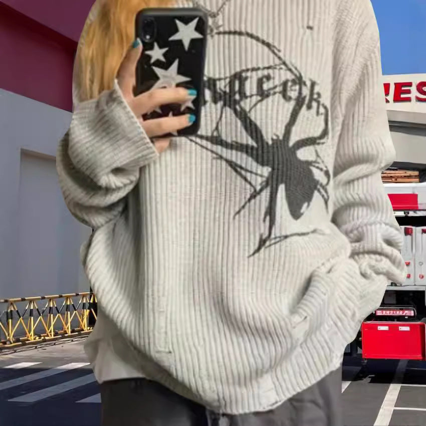 Pull en maille surdimensionné pour femmes avec un motif de araignée frappant Chic und Stil