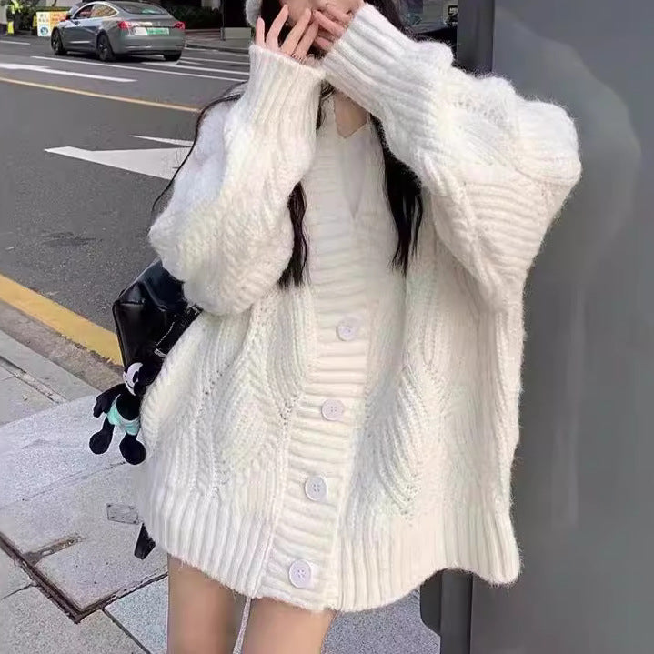 Dames gros tricot cardigan avec des manches surdimensionnées et de grands détails de bouton Chic und Stil