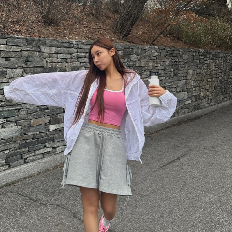 Veste coupe-vent légère pour femme avec capuche et poche kangourou Chic & Stil