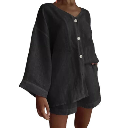 Casual women's outfit with a loose top and shorts Chic and Style