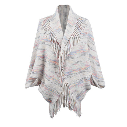 Dame poncho en tricot avec des franges luxueuses et un design moderne Chic und Stil
