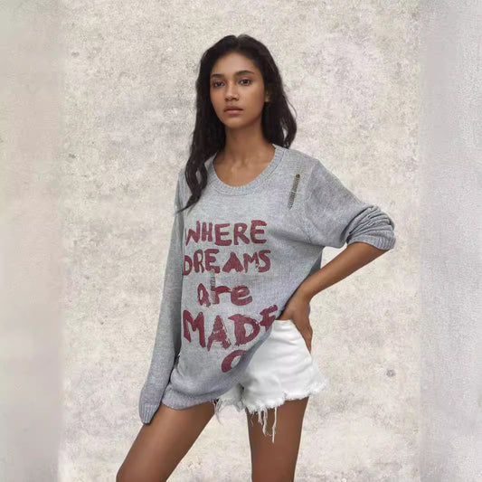 Dames pull oversize décontracté avec inscription accrocheuse et détails en tricot Chic und Stil