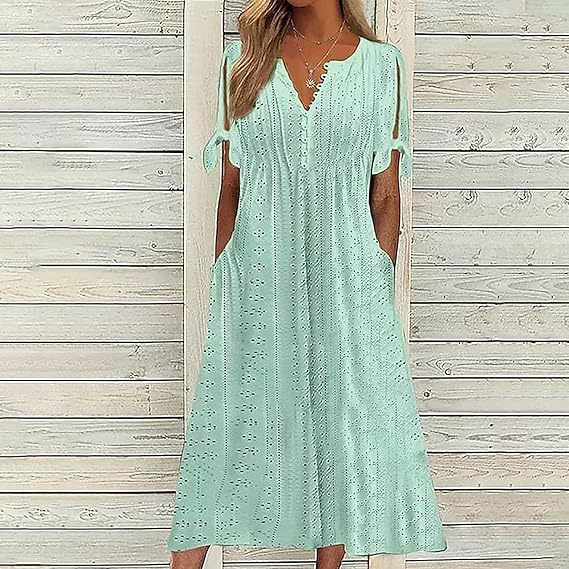 Robe midi aérienne pour femmes avec des motifs en trou décoratifs et des poches pratiques Chic und Stil