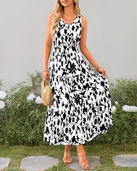 Robe maxi femme avec des appliques florales et des bretelles étroites Chic und Stil