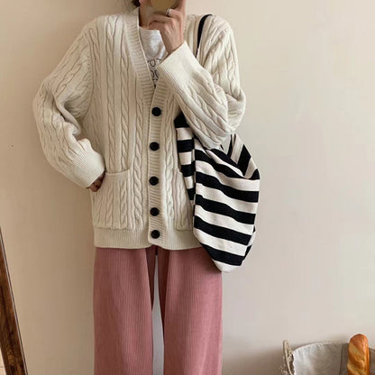 Dames gilet en gros tricot avec motif en trèfle et poches pratiques Chic und Stil