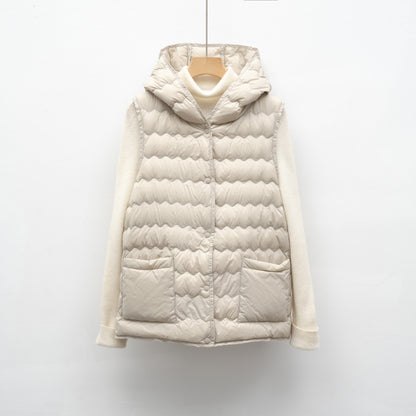 Dames gilet matelassé avec capuche Chic und Stil