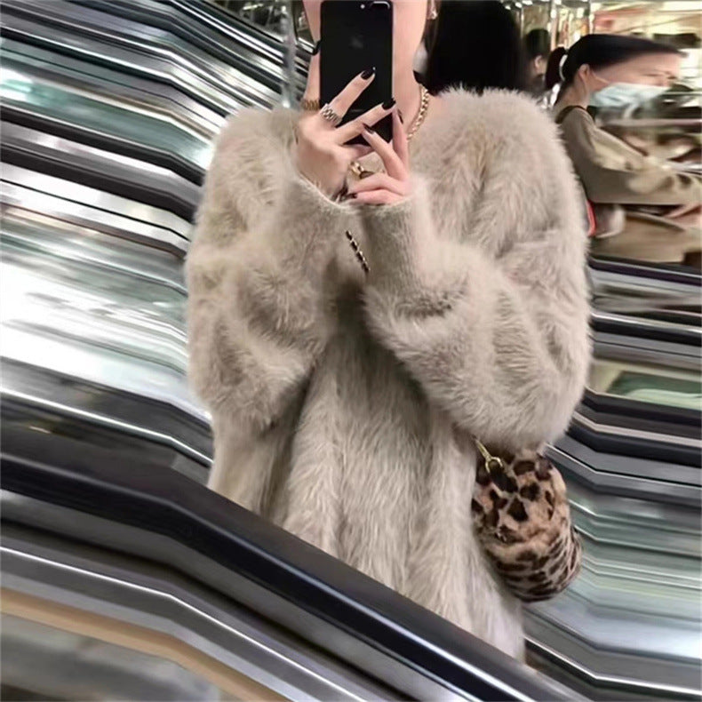Femmes Pull en peluche à col rond avec coupe décontractée et taille oversize Chic und Stil