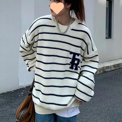 Pull en tricot surdimensionné décontracté pour femmes avec des rayures cassées et une poche poitrine Chic und Stil